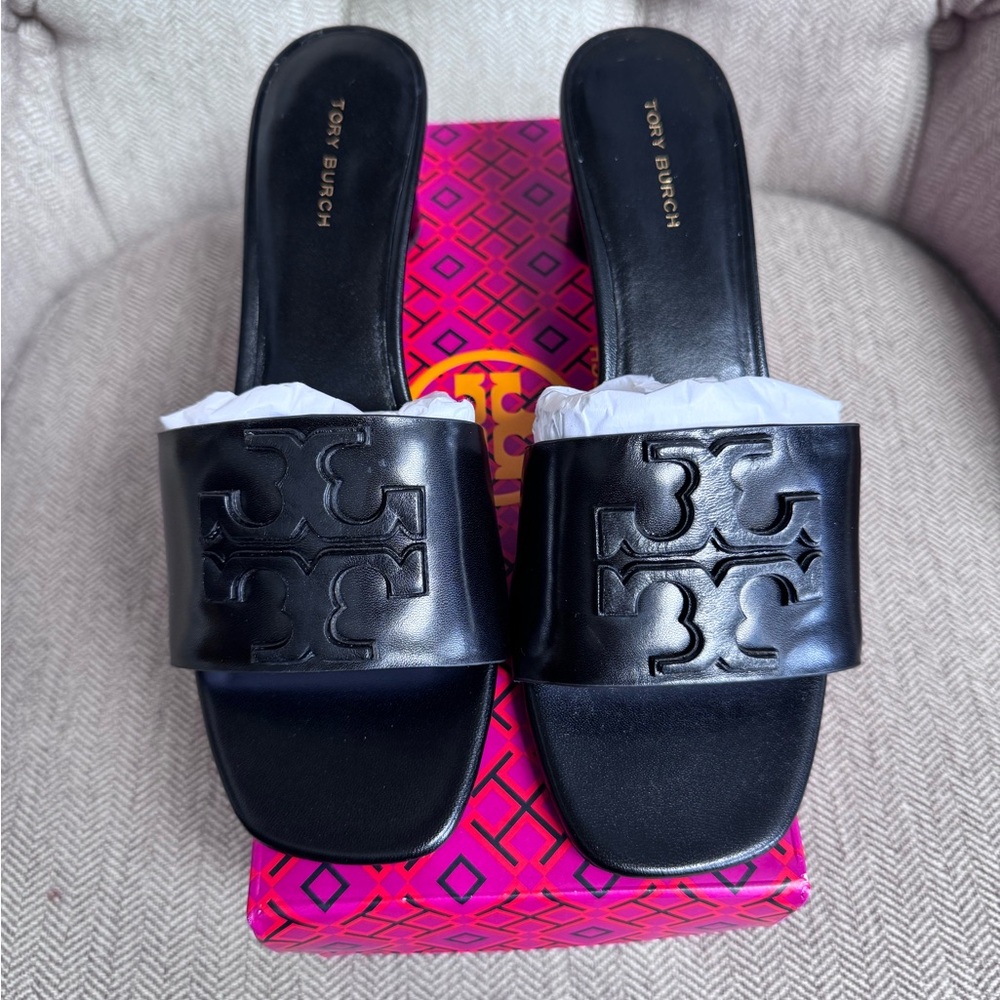 Tory Burch (brand new) Black Leather Mules. (I missed the return window).